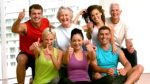 fitness-class-showing-thumbs-up-slow-motion-51026167
